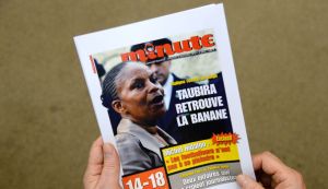 la-une-de-l-hebdomadaire-minute-le-12-novembre-2013_4527002